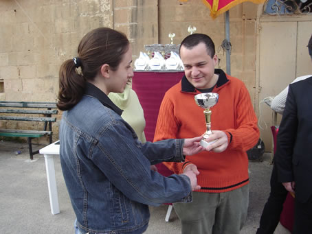 M4 Councillor Kevin Cutajar presenting a cup