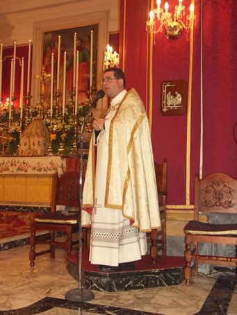 J3 Zebbug Archpriest Can R Micallef addresses the congregation