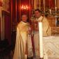 J6 Archpriest Micallef receiving a souvenir