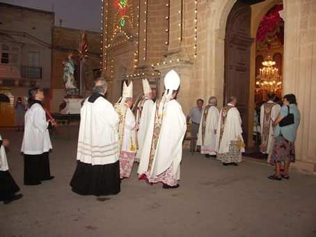 A6 Bishop Cauchi entering the Basilica