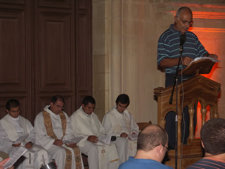 D3 Peter Curmi with his two priest sons behind him