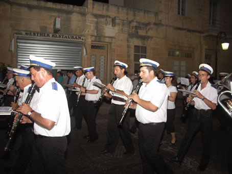 J4 Victory Band marches up 8th Sept Avenue