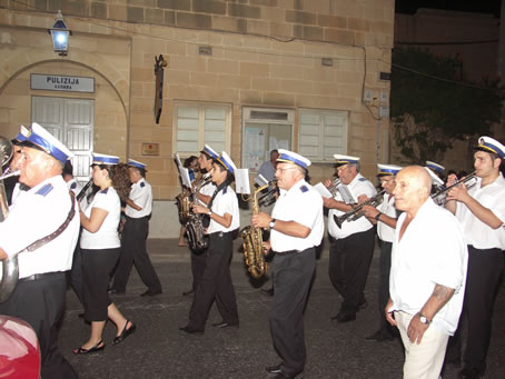 J2 Victory Band marches up 8th Sept Avenue