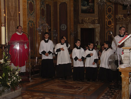 B5 Sem Cachia directs the young Congregation in singing