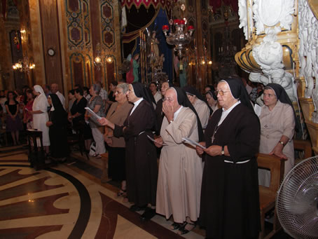 A4 Nuns from different Congregations attending Mass