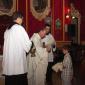 B7 Fr Daniel sprinkles Holy Water on the habit of altar boys