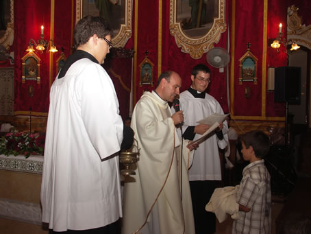 B5 Fr Xerri accepts Joachim as an altar boy