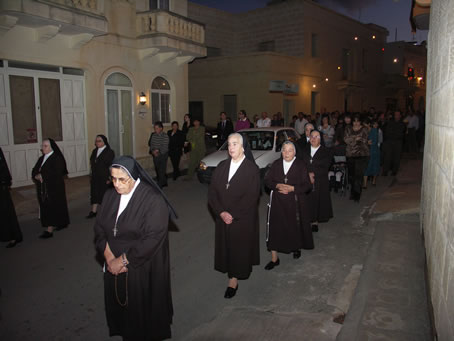 E9 Franciscan Sisters follow procession reciting prayers