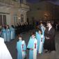 E8 Choir Santa Klara follow procession singing hymns