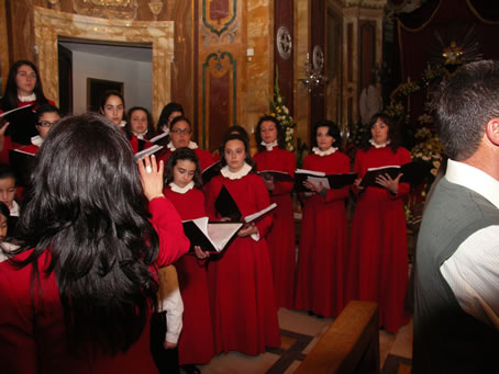 F4 Choir singing during the Collection