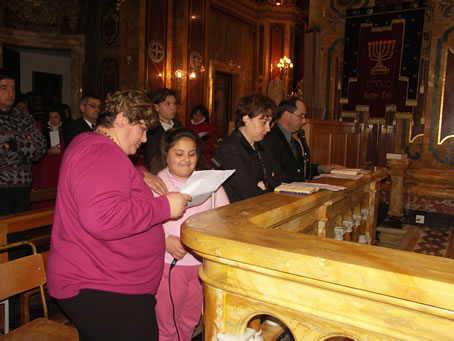 A6 Mother and daughter taking a part in the Liturgy