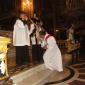 F3 Deacon Richard N Farrugia kisses the Cross