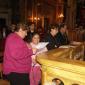 A6 Mother and daughter taking a part in the Liturgy