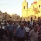 058 Faithful in procession reciting the Rosary