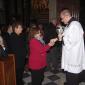 64 Relative of Mark receives Holy Communion