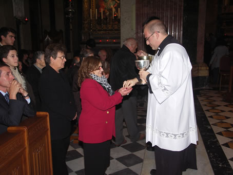 64 Relative of Mark receives Holy Communion