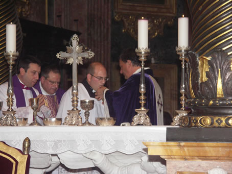 58 Mark receives Holy Communion from Bishop