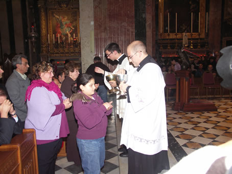 62 Mark gives Holy Communion to his cousin Nathania Camilleri