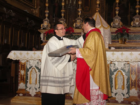 A8 Archpriest presents Parish farewell gift to Fr Joseph