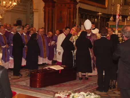 142 Presenting the offerings to Bishop Mario Grech