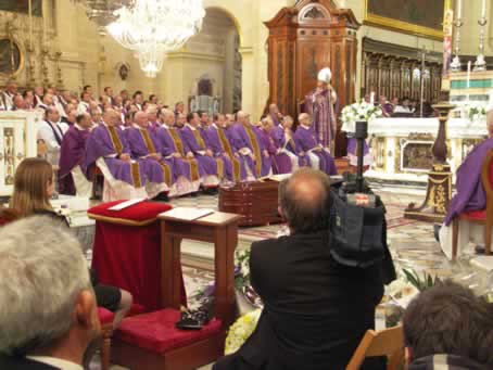 128 Bishop Grech delivers the Homily