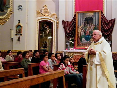 44 Fr Tonio Mifsud Ofm Conv. celebrating Mass on 20th