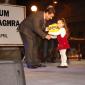 F7 Mayor presents books to a toddler