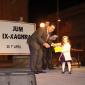 F9 Mayor presents books to a toddler