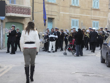 A4 Victory Band marches down Triq il-Qbajjar