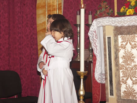 L9 Altar Boys receiving benediction