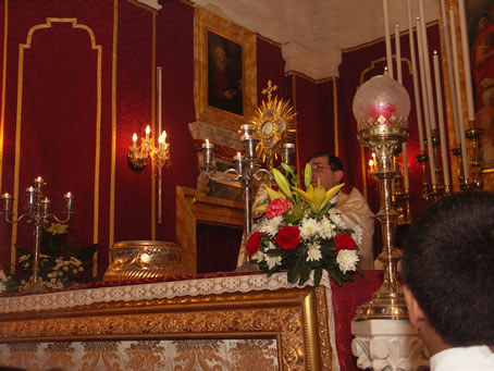 L7 Mgr Refalo Xaghra Archpriest imparting Benediction