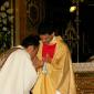 179 Priest kissing Fr Caruana's hands