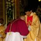 177 Archpriest Emeritus kisses Fr Caruana's hands