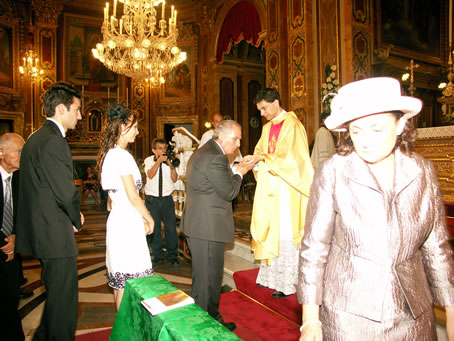 188 Fr Caruana's father kissing his son's hands