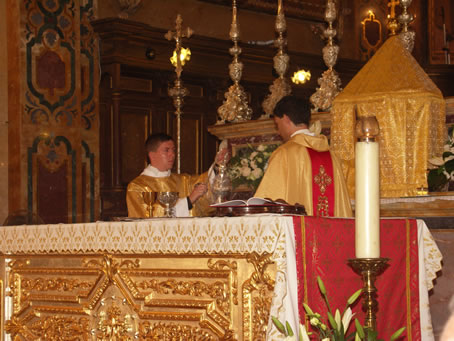 125 Deacon incensing the new priest