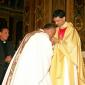 185 Priest kissing Fr Caruana's hands