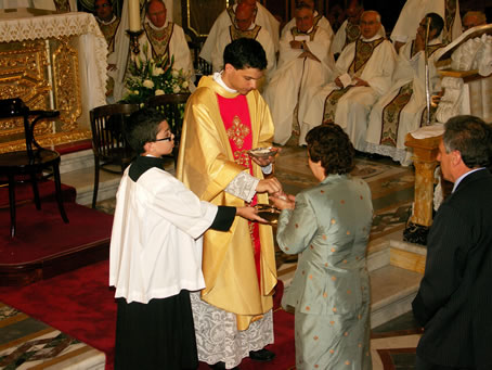 161 Gozo Minister receives Holy Communion