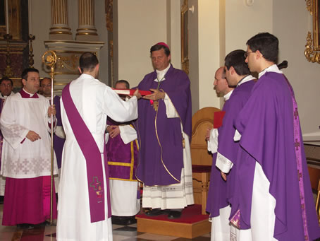 C3 Bishop receives the Bible book