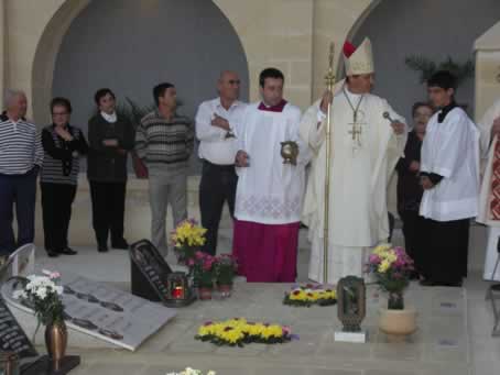 122 Bishop blessing new graves