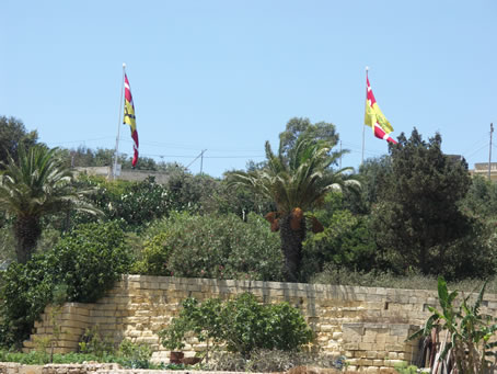 010 Flags decorate entrance to Xaghra