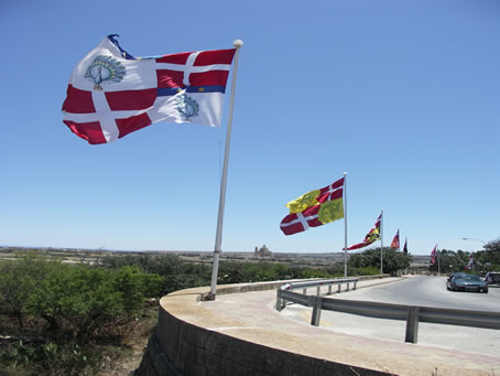 001 Flags decorate entrance to Xaghra