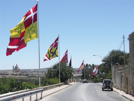 002 Flags decorate entrance to Xaghra