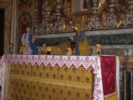 008 Baby Jesus covered on the side altar