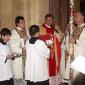 A4 Can John Sultana holding the Paschal Candle