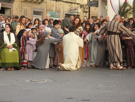 C2 Children flock to touch Jesus