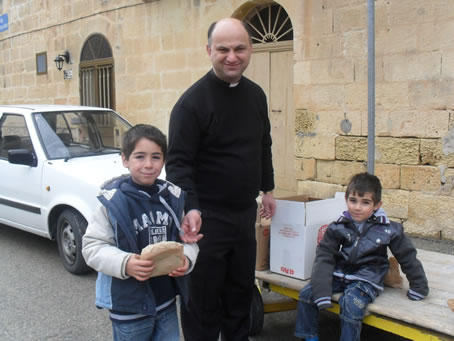 H6 Young boy receiving sweets