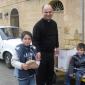 H6 Young boy receiving sweets