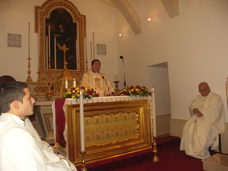 C4 Archpriest Mgr Refalo delivering the homily