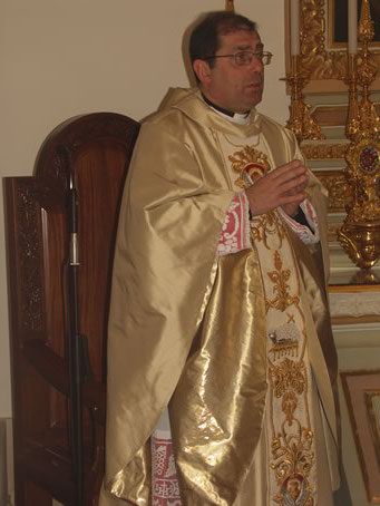 C3 Archpriest Mgr Refalo delivering the homily