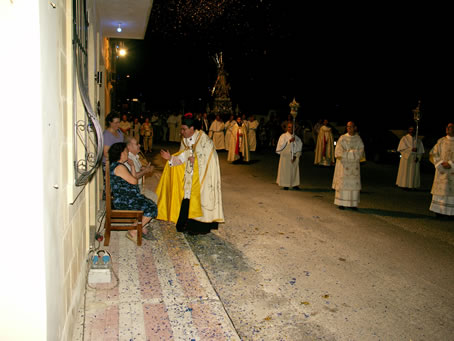 072 Archpriest greeting the senior citizens